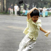 Bird pooping on child